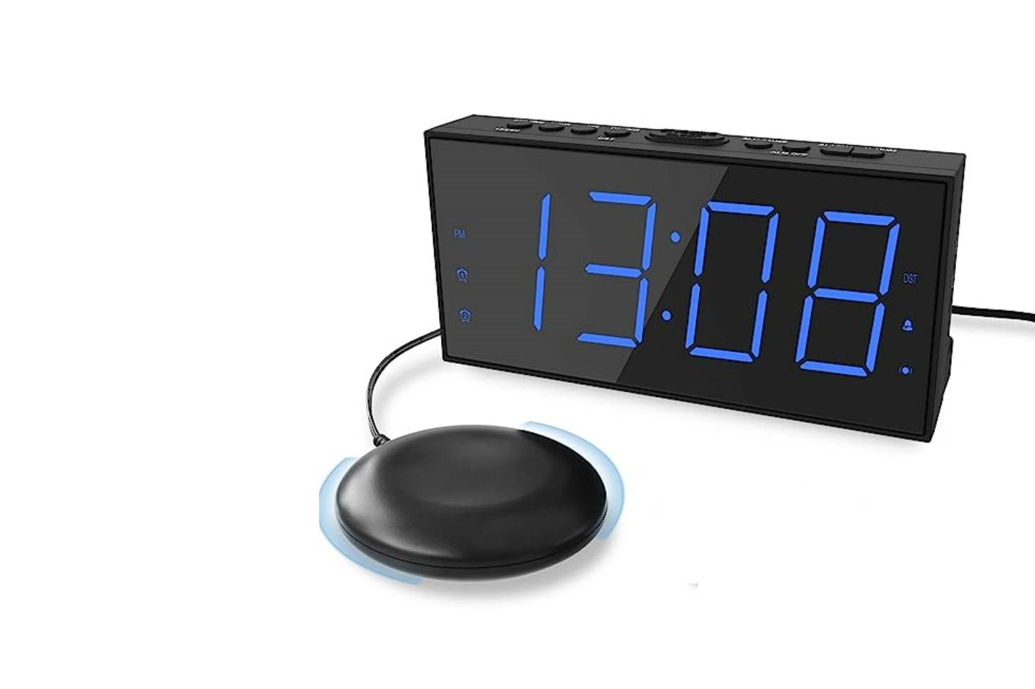 Vibrating alarm clock showing the LED display of time in blue, and the round-shaped vibrating unit.
