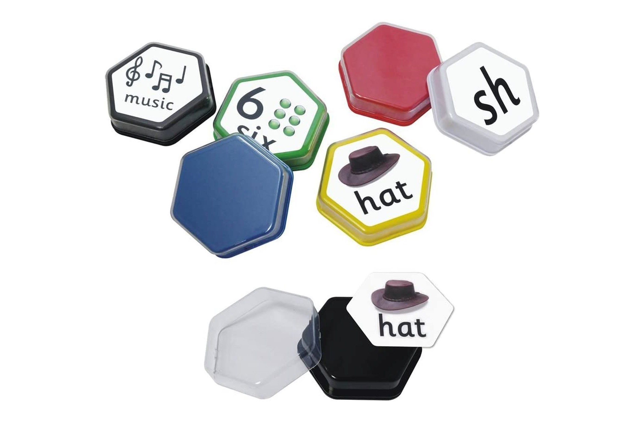 Hexagon-shaped talking tiles in 6 various colours of black, blue, green, yellow, red, and white, with some labelled with white stickers on top.