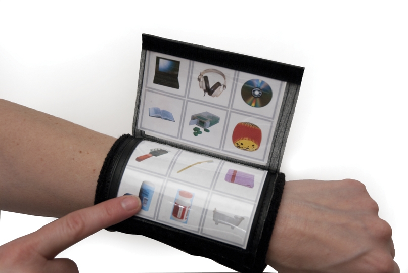Picture of the Flip and Communicate Wrist Wrap worn by an individual.