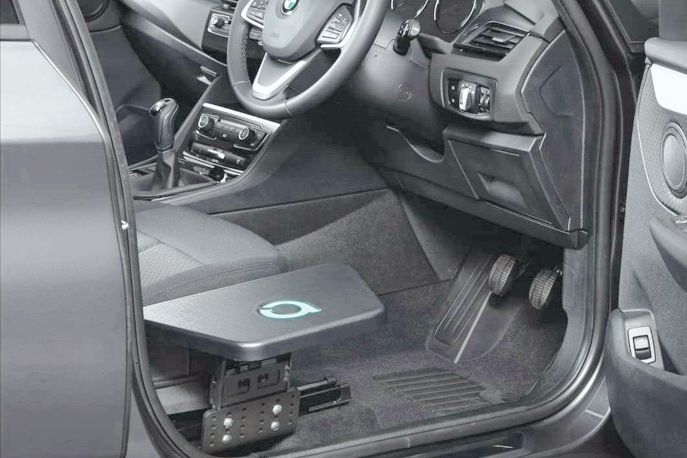Transfer Plate by Autochair placed at the right side of the driver's seat in car.