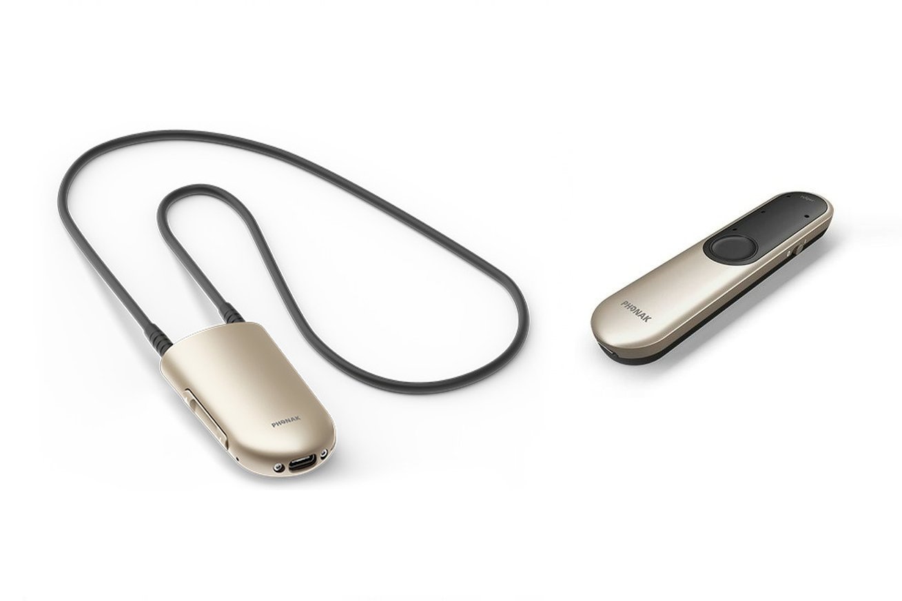 Phonak Roger On microphone device on the right, and Phonak Neckloop on the left.